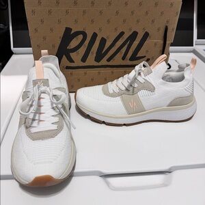 Women’s rival tennis shoe. White, light tan, and a little pale pink